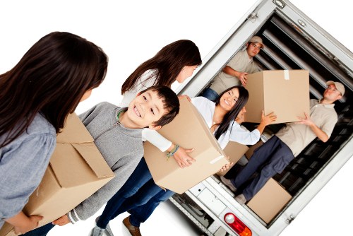 Man With Van Chelsea loading recyclable moving materials with careful sorting