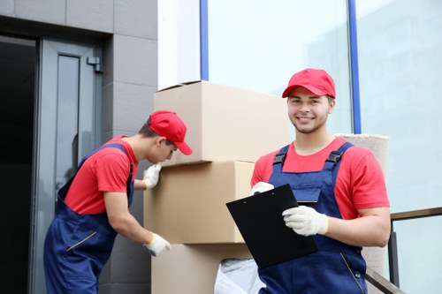 Professional packing team organising boxes inside a Chelsea apartment