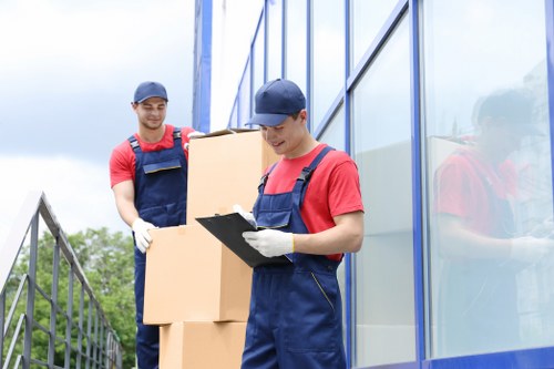 Moving van service carrying boxes and furniture for a Chelsea booking