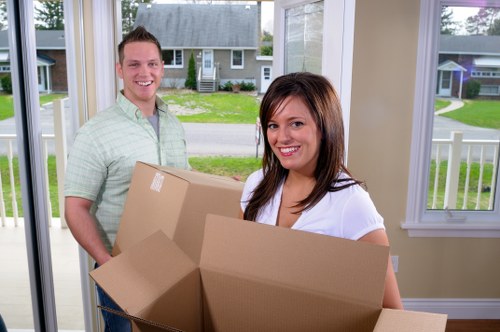 Checklist and boxed household items prepared for moving day in Chelsea