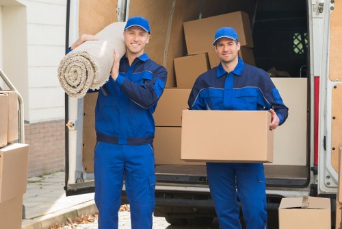 Moving office furniture through a central London building in Chelsea