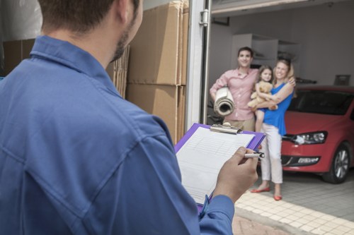 Removal van ready for a Chelsea flat move on a narrow London street