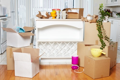Removal team loading boxes and furniture in Chelsea