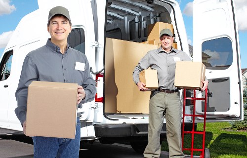 Chelsea flat move with a van service on a narrow residential street