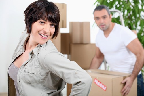 Team preparing office furniture and equipment for a Chelsea business move