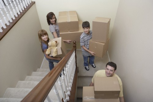 Moving crew navigating access challenges in a Chelsea property